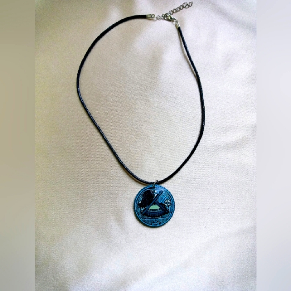 Handmade acrylic pendant with broom and a stick
